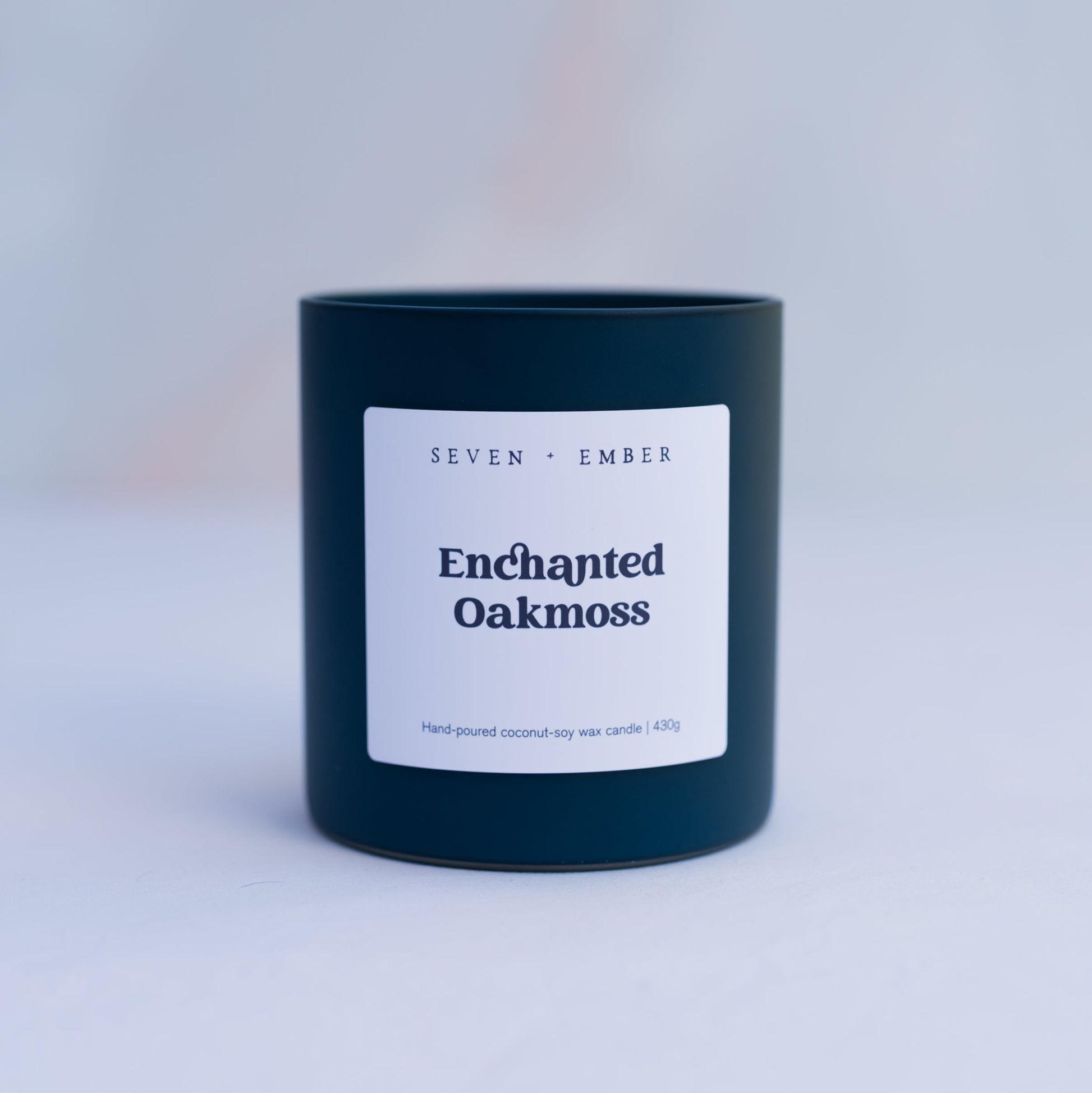 Enchanted Oakmoss candle in Navy coloured frosted glass jar