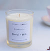 a cereal and milk moodstory candle on a marble background