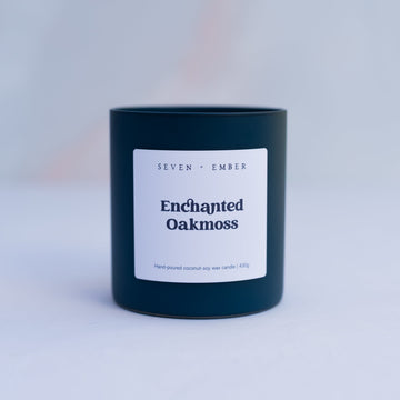 Enchanted Oakmoss candle in Navy coloured frosted glass jar